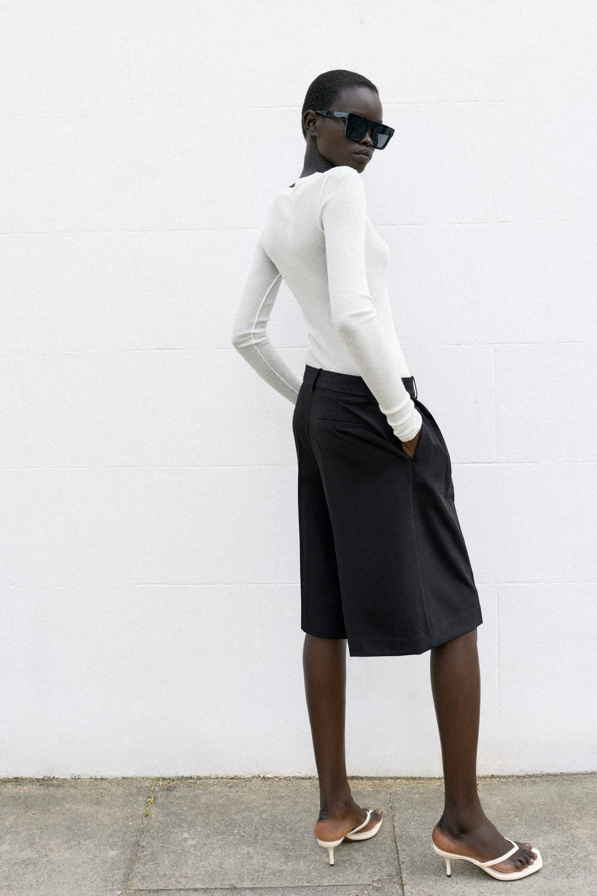 LONG PLEATED BERMUDA SHORTS